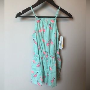 Adorable mint green romper with pink flamingos